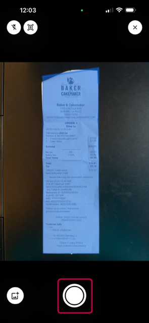 Camera view in the mobile app showing a receipt centered and ready to be captured.